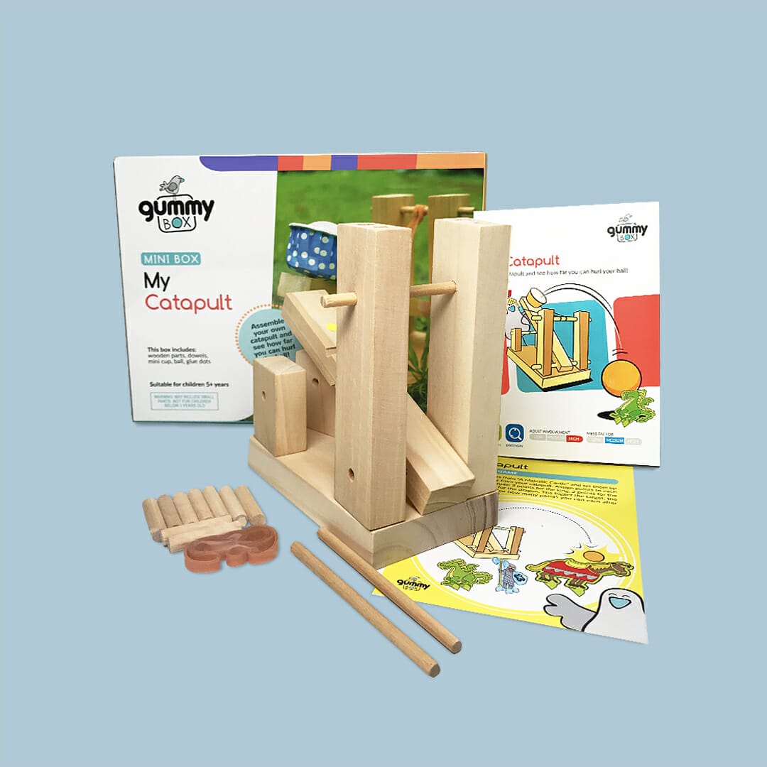 Wooden catapult toy by GummyBox