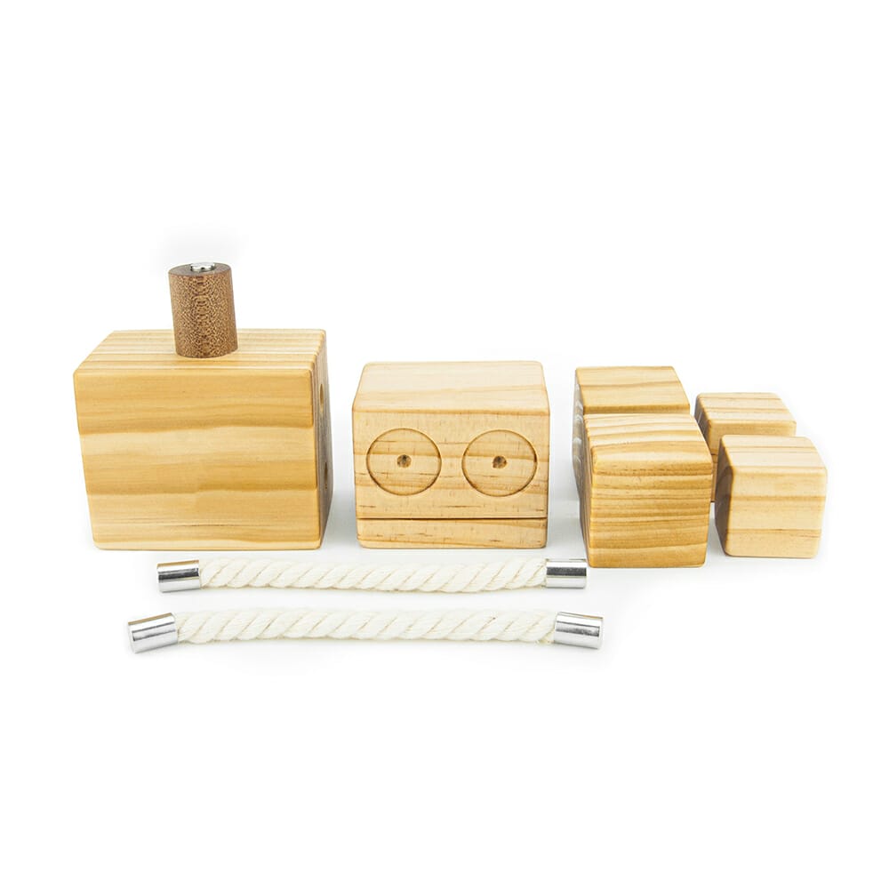 Click and connect magnetic wooden robot in parts